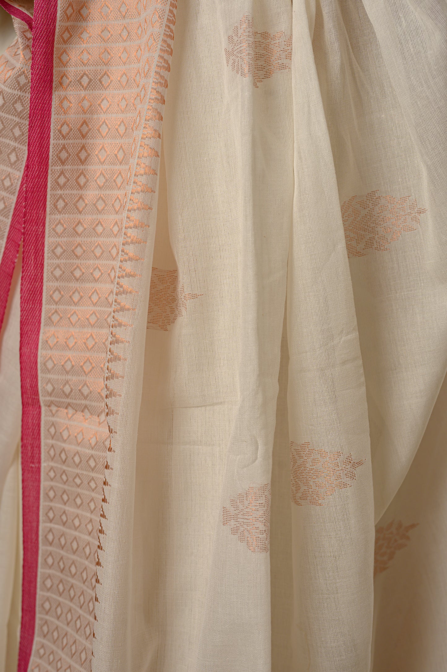 Sadhna Saree - White Jamdani with copper zari work