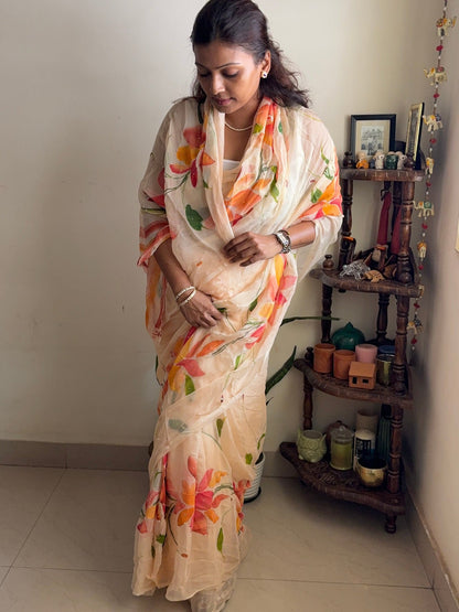 Hand-painted chiffon saree - peach with zari work